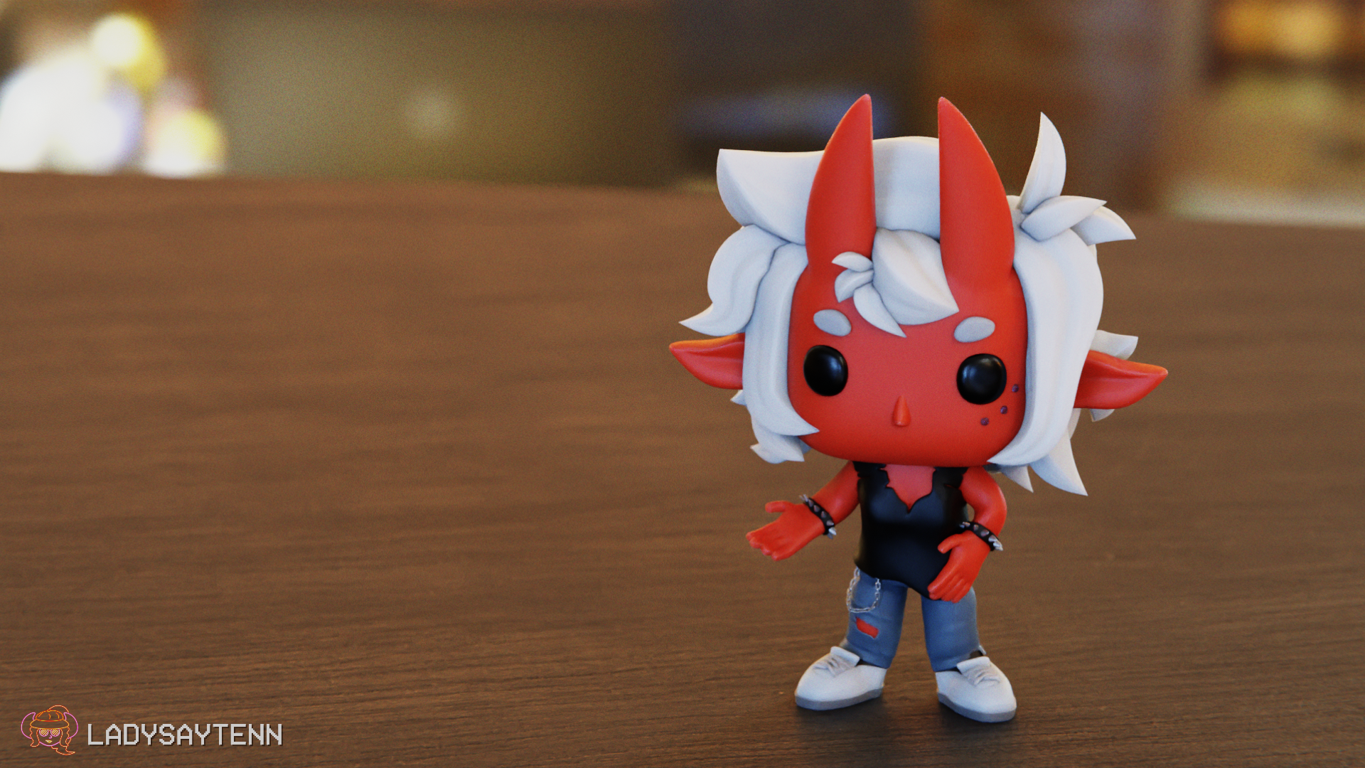 Vinyl figure of a red imp with white hair, a black tattered shirt, ripped blue jeans, white sneakers, a wallet chain, and spiked armbands.